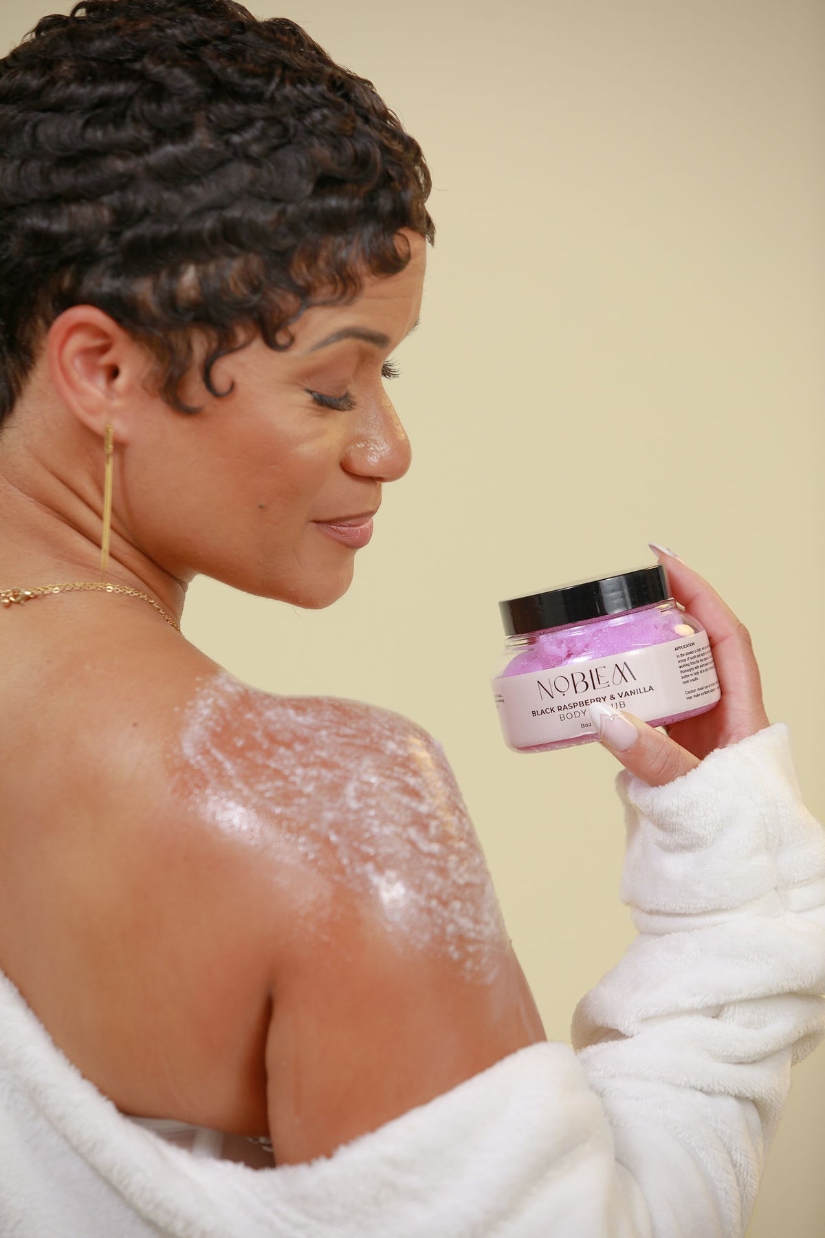 Amanda holding Noblem body scrub